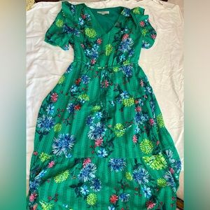 Gorgeous emerald green and floral midi length dress. V-neck cut.